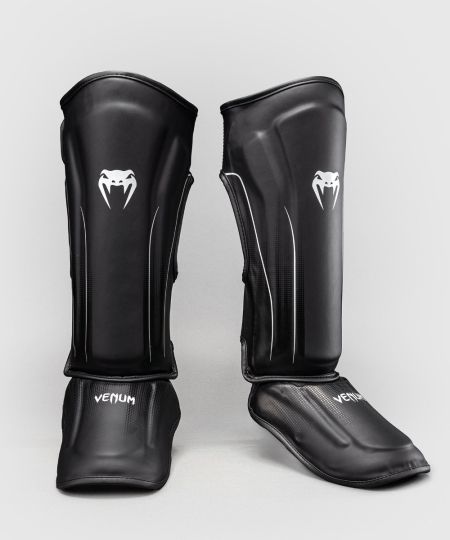Venum Stealth scheenbeschermers - Zwart/Wit
