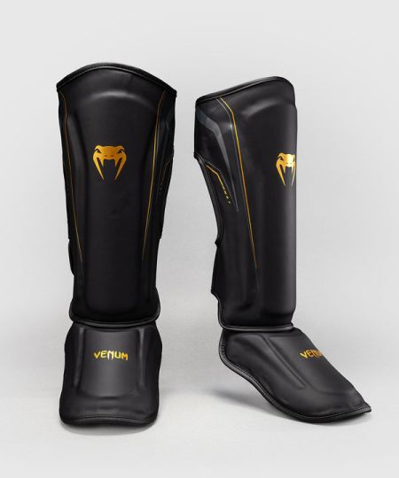 Venum Streamline scheenbeschermers - Zwart/Goud
